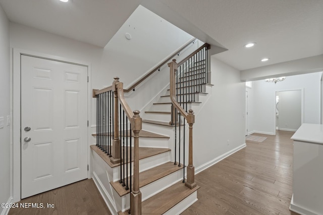 305 Garden Ln, Atlantic Beach, FL 32233 - stairs featuring recessed lighting, baseboards, and wood finished floors
