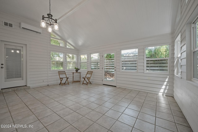 unfurnished sunroom with an AC wall unit, a chandelier, and lofted ceiling