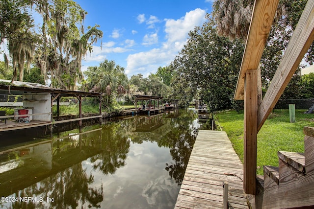 dock area featuring a water view