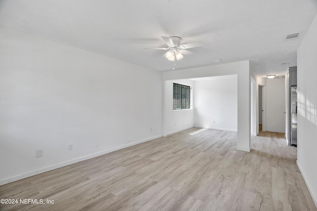 4435 Bedivere Rd, Jacksonville, FL 32208 - empty room with a ceiling fan, baseboards, light wood-style floors, and visible vents