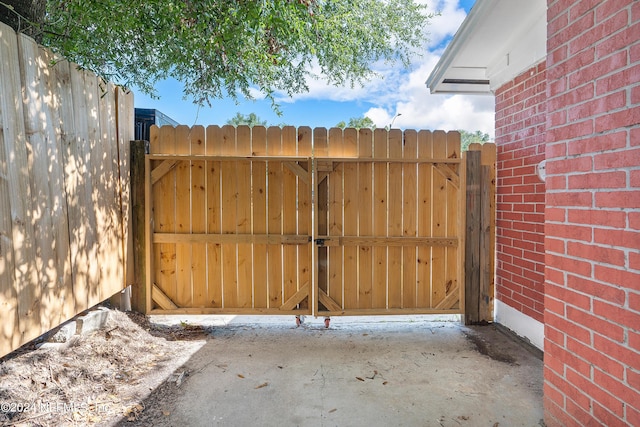 4435 Bedivere Rd, Jacksonville, FL 32208 - view of gate featuring fence