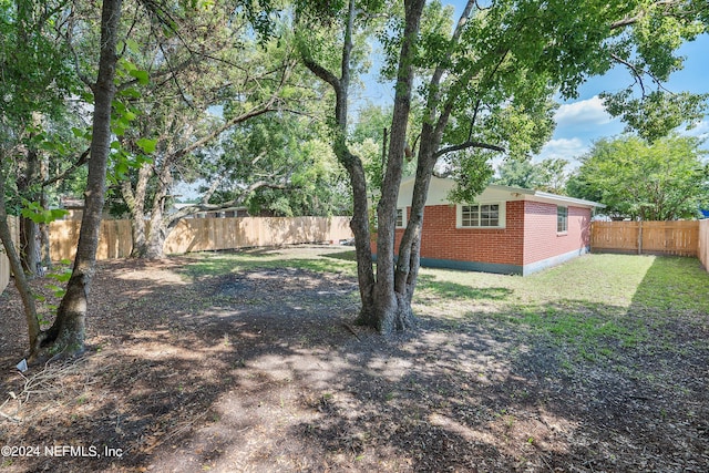4435 Bedivere Rd, Jacksonville, FL 32208 - view of yard featuring a fenced backyard