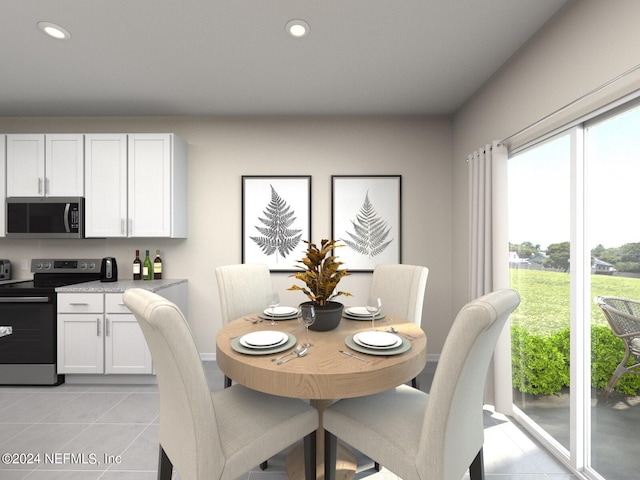 dining area with light tile patterned floors