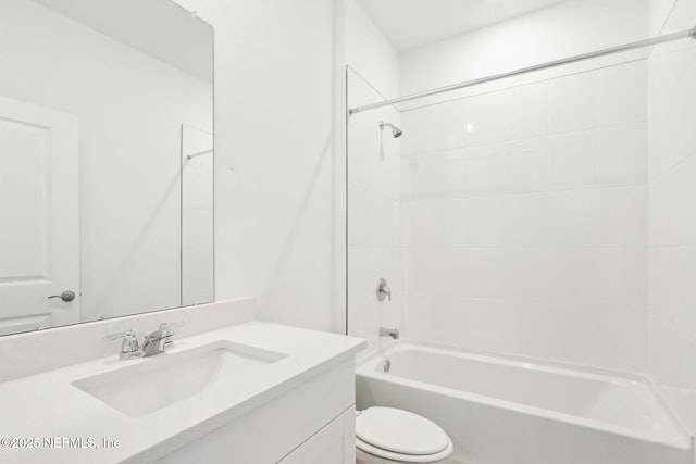 full bathroom featuring shower / bath combination, vanity, and toilet