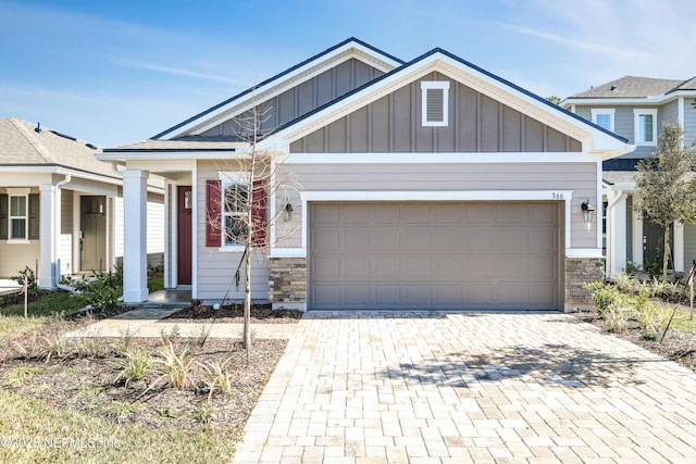 craftsman-style house featuring a garage