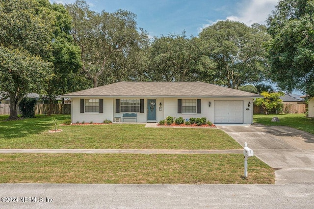 ranch-style house with a front lawn and a garage