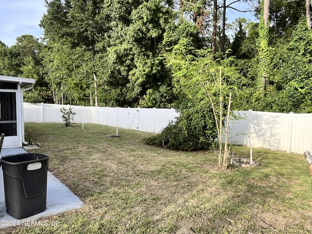 view of yard featuring a fenced backyard