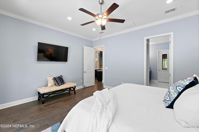 bedroom featuring dark wood-type flooring, ceiling fan, ornamental molding, and connected bathroom