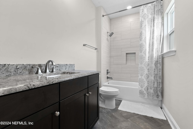 full bathroom with vanity, toilet, and shower / bath combo