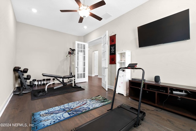 exercise area with french doors, ceiling fan, and dark hardwood / wood-style flooring