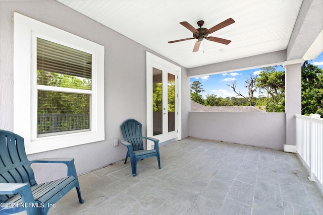 view of patio with french doors and ceiling fan