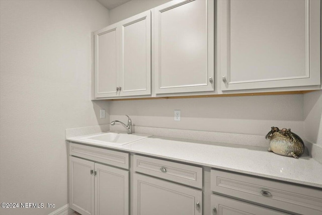 laundry area featuring sink