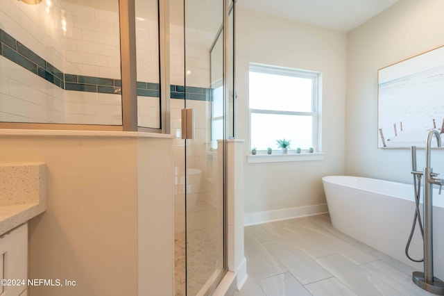 6833 A Ave, Saint Augustine, FL 32080 - full bath with a stall shower, a freestanding bath, vanity, and baseboards