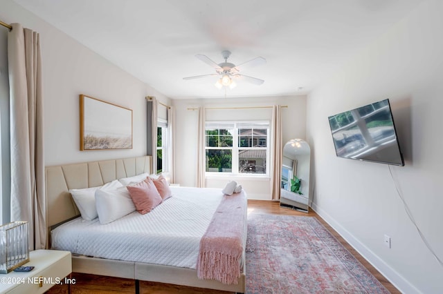 6833 A Ave, Saint Augustine, FL 32080 - bedroom with wood finished floors, baseboards, and ceiling fan