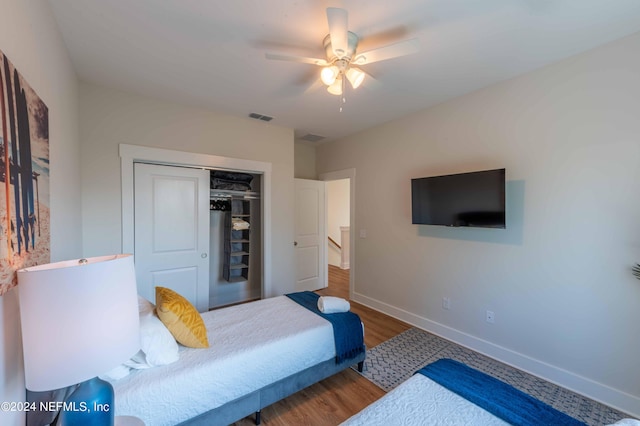 6833 A Ave, Saint Augustine, FL 32080 - bedroom with baseboards, wood finished floors, a closet, and ceiling fan