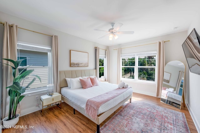 6833 A Ave, Saint Augustine, FL 32080 - bedroom featuring wood finished floors, a ceiling fan, and baseboards