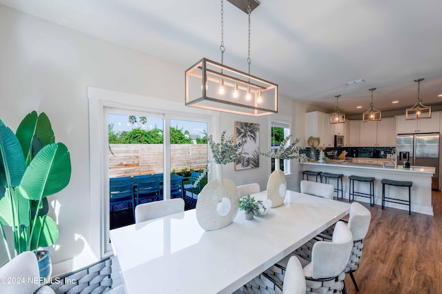6833 A Ave, Saint Augustine, FL 32080 - dining room with dark wood-style flooring