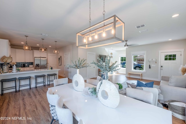 6833 A Ave, Saint Augustine, FL 32080 - dining area with wood finished floors, recessed lighting, baseboards, and ceiling fan