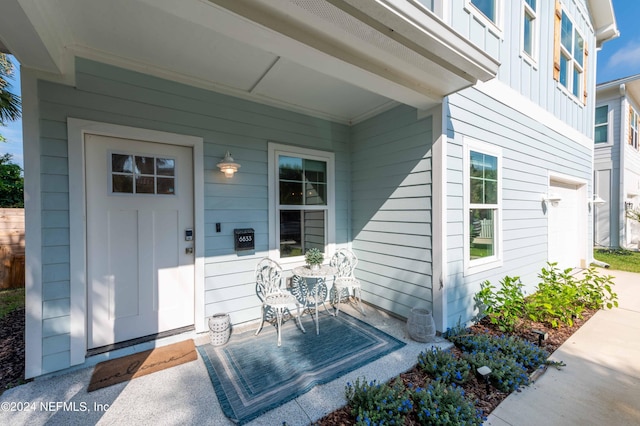 6833 A Ave, Saint Augustine, FL 32080 - property entrance featuring covered porch and board and batten siding