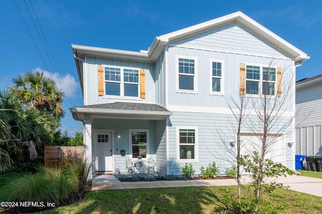 6833 A Ave, Saint Augustine, FL 32080 - view of front facade with board and batten siding and driveway
