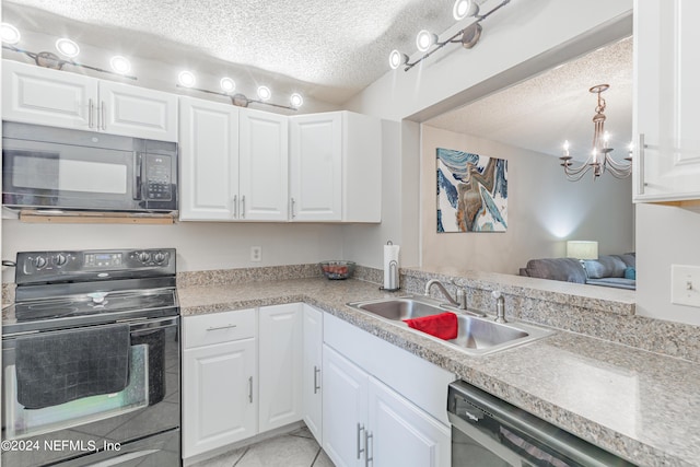 kitchen with white cabinetry, sink, and black appliances