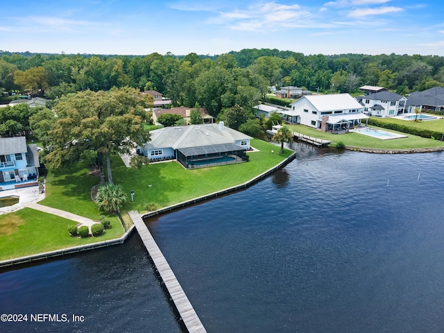 bird's eye view featuring a water view and a view of trees