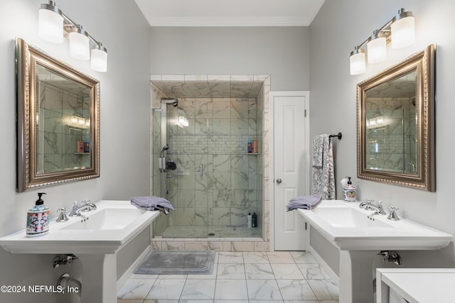 bathroom with marble finish floor, a shower stall, and crown molding