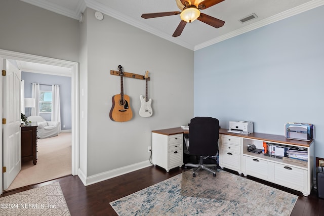 home office with baseboards, visible vents, a ceiling fan, dark wood-style flooring, and crown molding