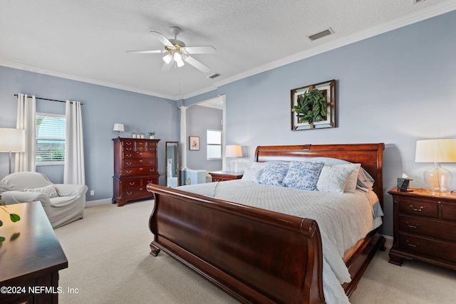 bedroom with light carpet, ornamental molding, visible vents, and baseboards