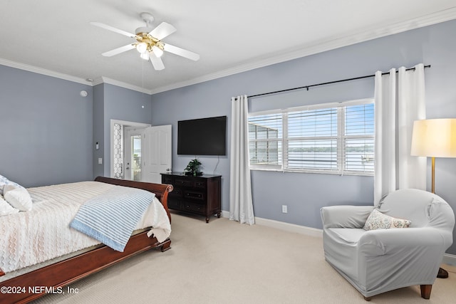 bedroom featuring a ceiling fan, baseboards, crown molding, and light colored carpet