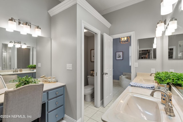 bathroom featuring toilet, a sink, ornamental molding, tile patterned floors, and double vanity