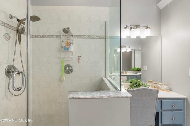 bathroom with walk in shower and vanity