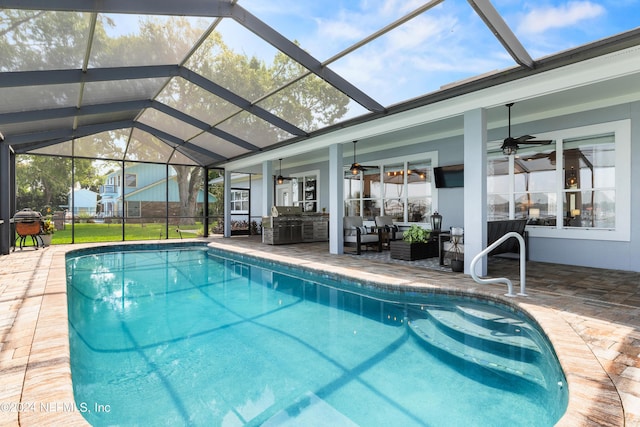 outdoor pool with glass enclosure, an outdoor living space, a ceiling fan, and a patio