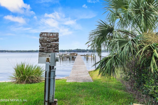 dock area featuring a water view