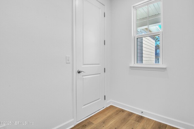 interior space with hardwood / wood-style floors