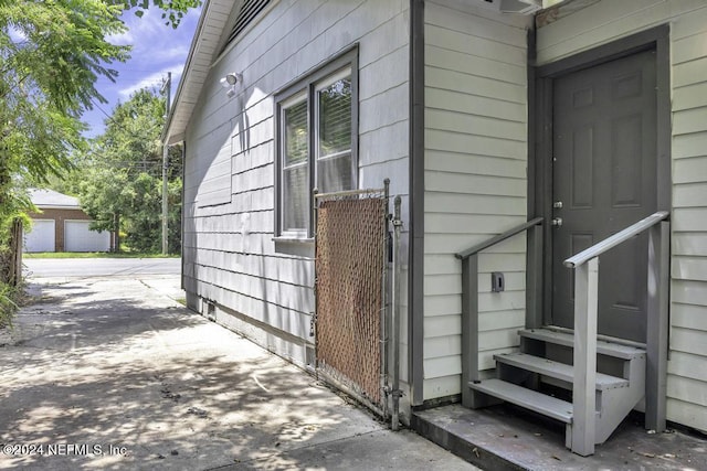 view of home's exterior with entry steps