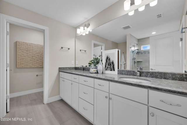 bathroom with dual bowl vanity