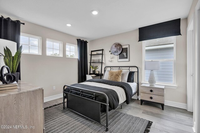 bedroom featuring wood-type flooring