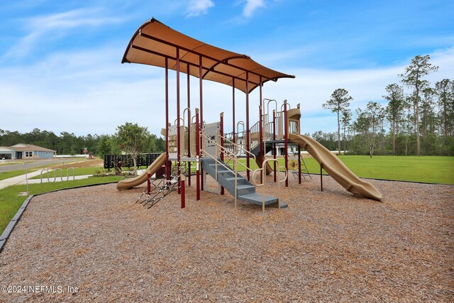 community play area featuring a yard