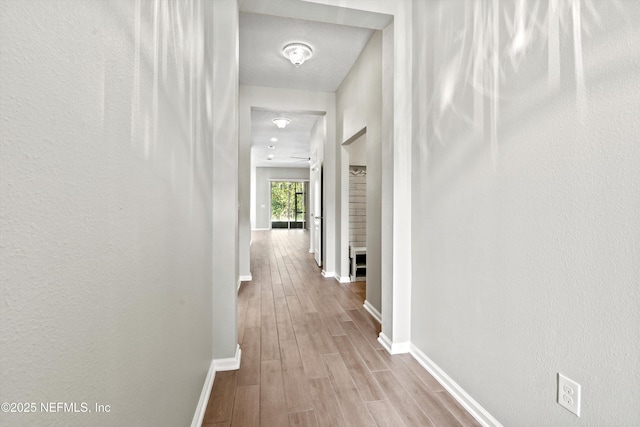 hallway featuring light hardwood / wood-style floors