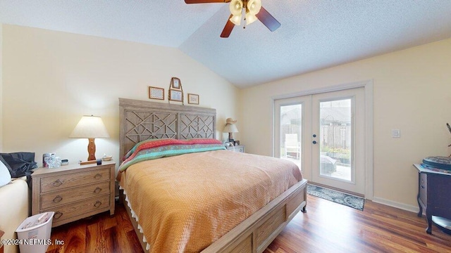 bedroom featuring vaulted ceiling, dark hardwood / wood-style floors, access to exterior, a textured ceiling, and french doors