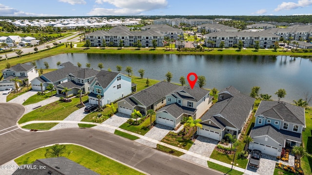 bird's eye view with a water view