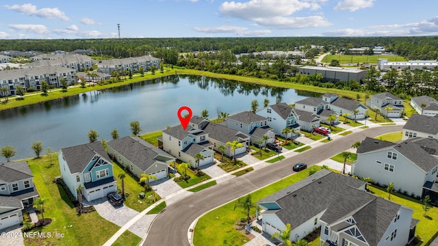 drone / aerial view with a water view