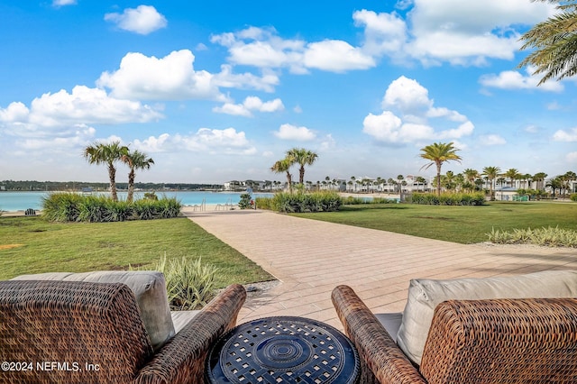 view of patio featuring a water view