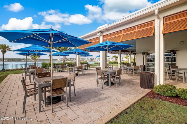 view of patio / terrace with a water view