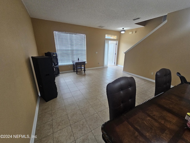 2727 Wood Stork Trl, Orange Park, FL 32073 - office space featuring light tile patterned floors, visible vents, baseboards, and a textured ceiling