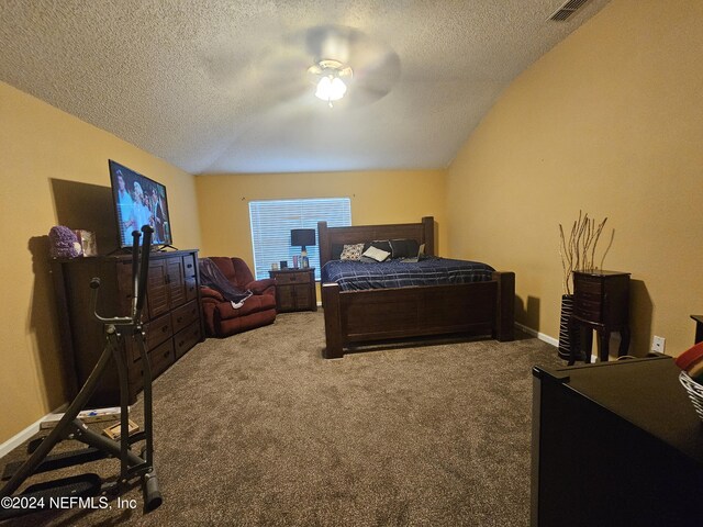 bedroom with carpet, a textured ceiling, and ceiling fan