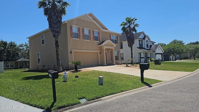 2727 Wood Stork Trl, Orange Park, FL 32073 - traditional-style house featuring stucco siding, a front lawn, a residential view, concrete driveway, and an attached garage
