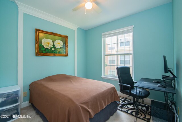 bedroom with crown molding and ceiling fan