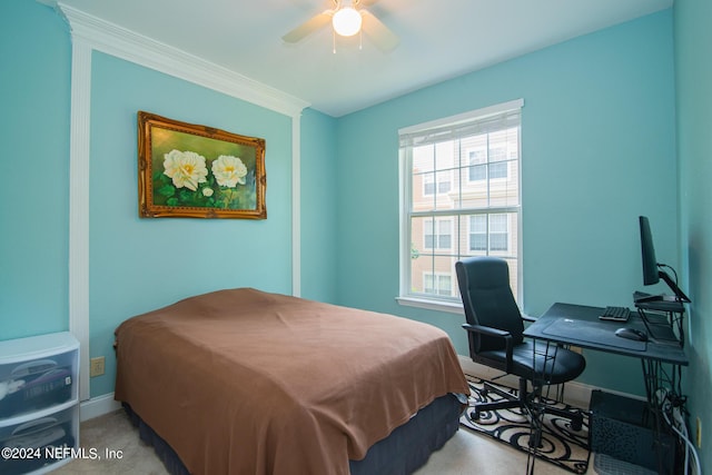 bedroom with ornamental molding, multiple windows, light colored carpet, and baseboards